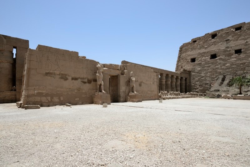 Interior display cases at Mansoura Museum with medieval artifacts